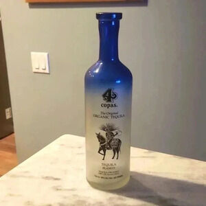 4 copas empty tequila bottle